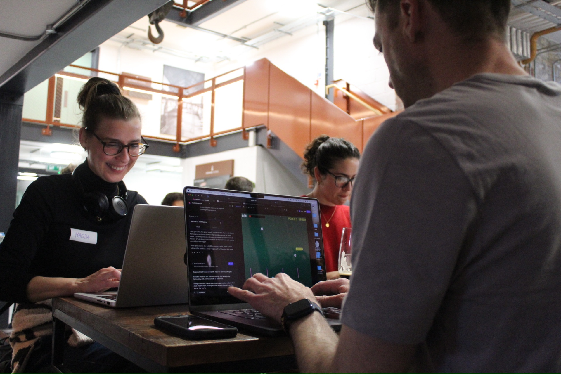 Bath Design Society members building a project together on a laptop